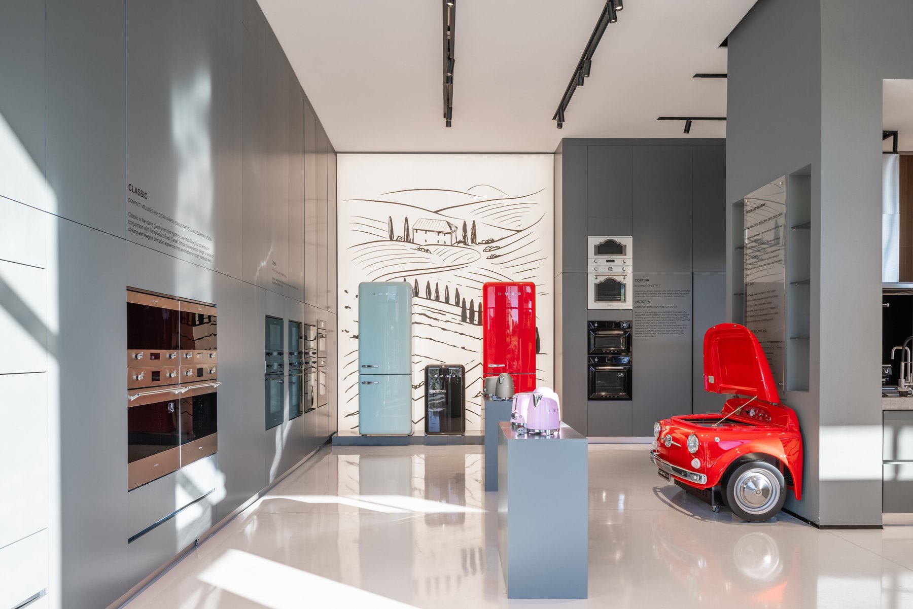 Smeg Albania flagship showroom with lacquered cabinetry