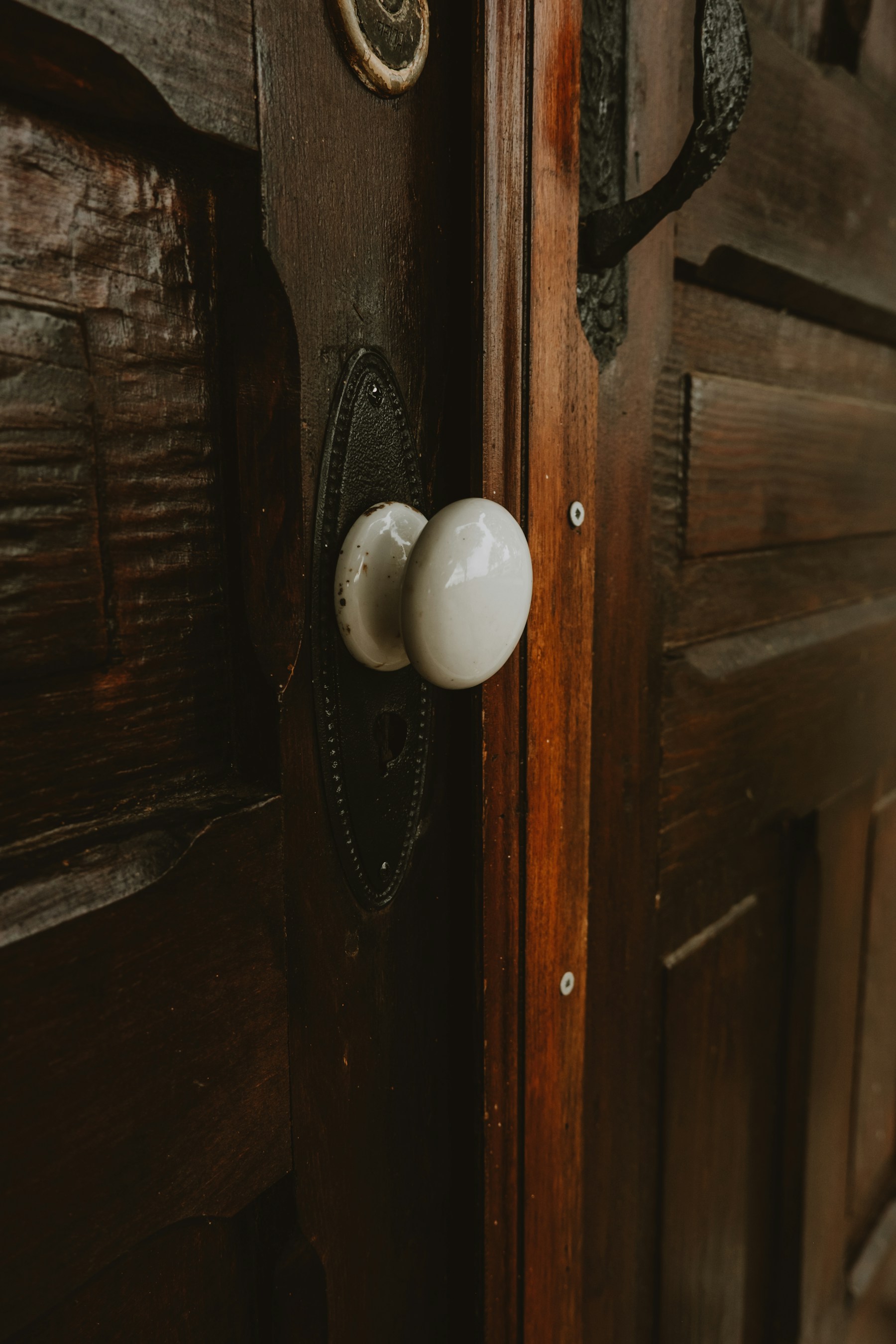 Brass handle on a wooden cabinet door